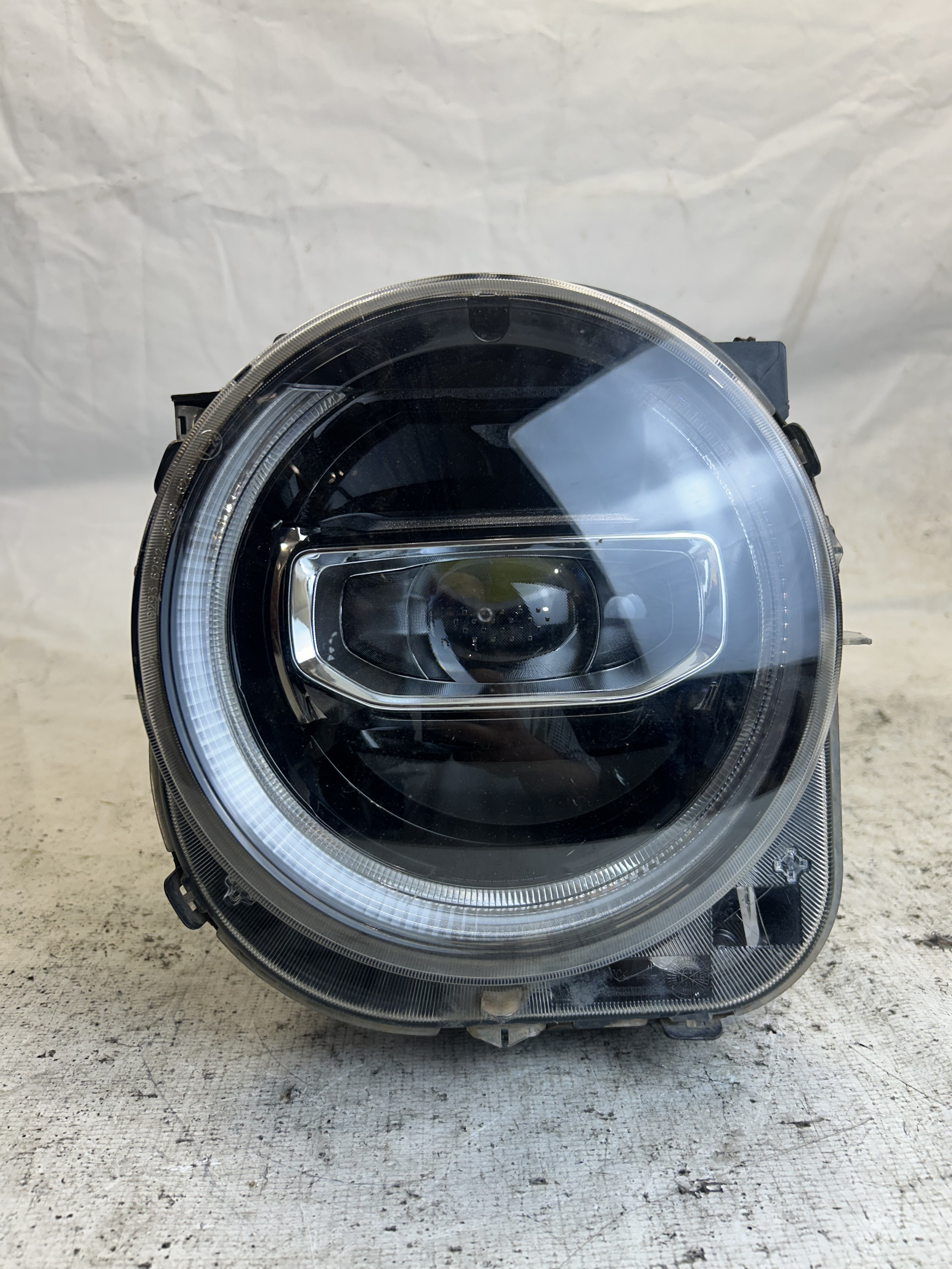 FAROL DIANTEIRO LADO ESQUERDO - 52144011 - 